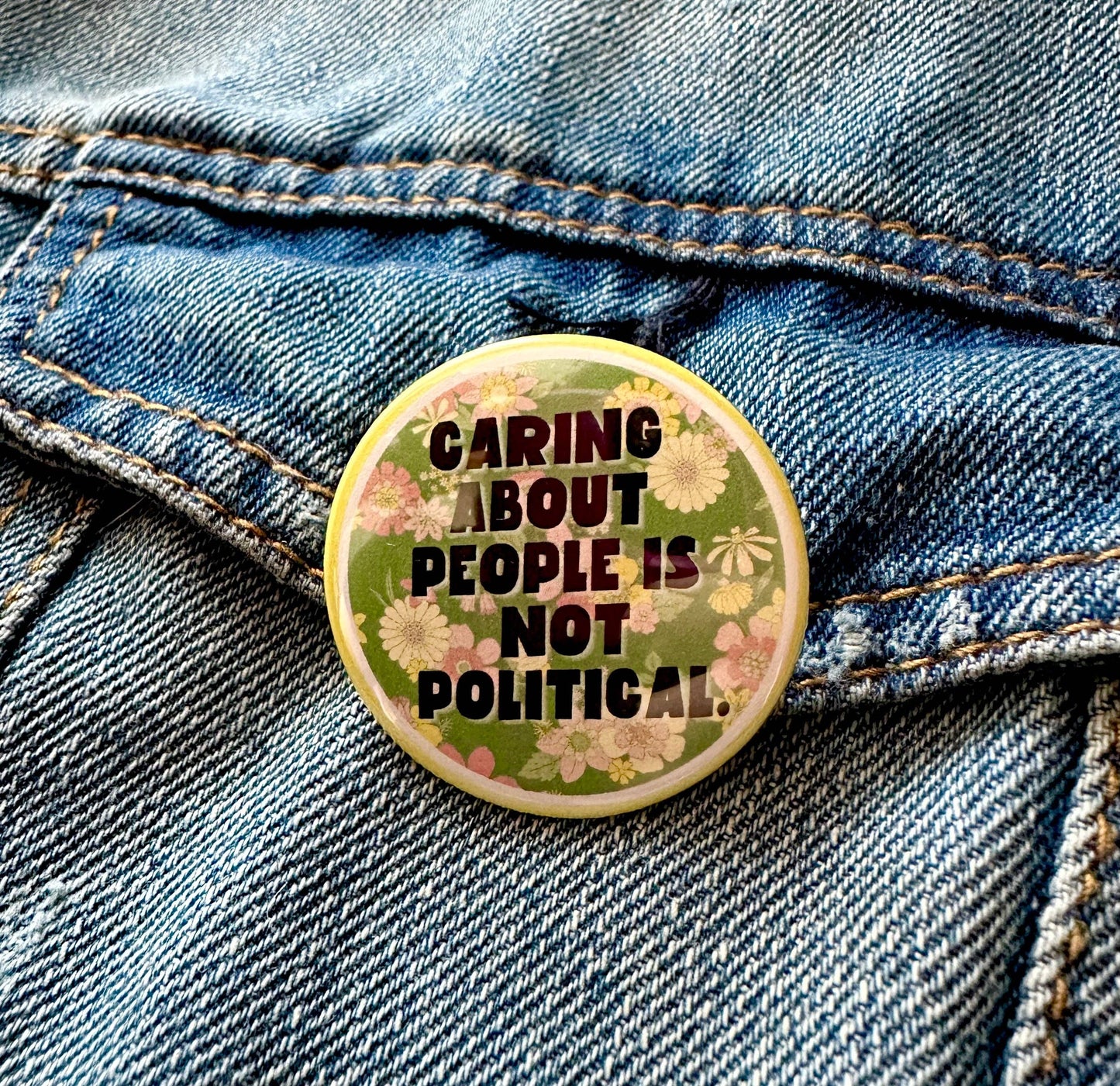 Caring About People Is Not Political Button
