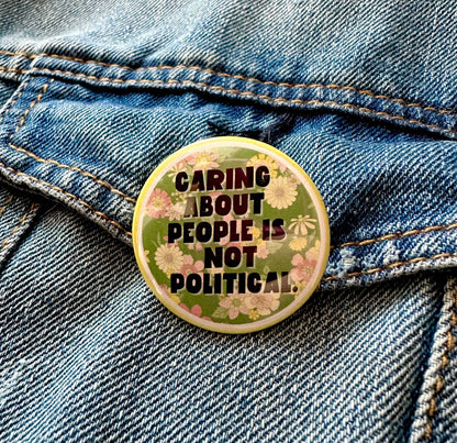 Caring About People Is Not Political Button