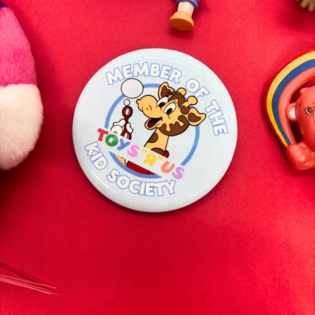 Member of the Toys R Us Kid Society Button Kish B. Designs